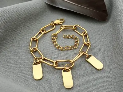 Сталевий браслет з підвісками